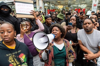 Protesters outside Peckham Hair and Cosmetics