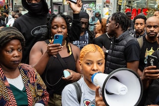 Protesters outside Peckham Hair and Cosmetics