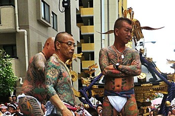 Yakuza tattoos on show as men and women hit the streets of Tokyo