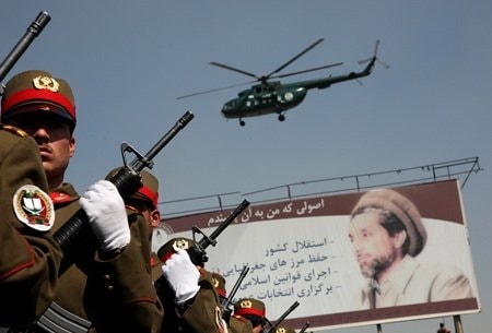 Soldiers from the Afghan National Army march in fr 2