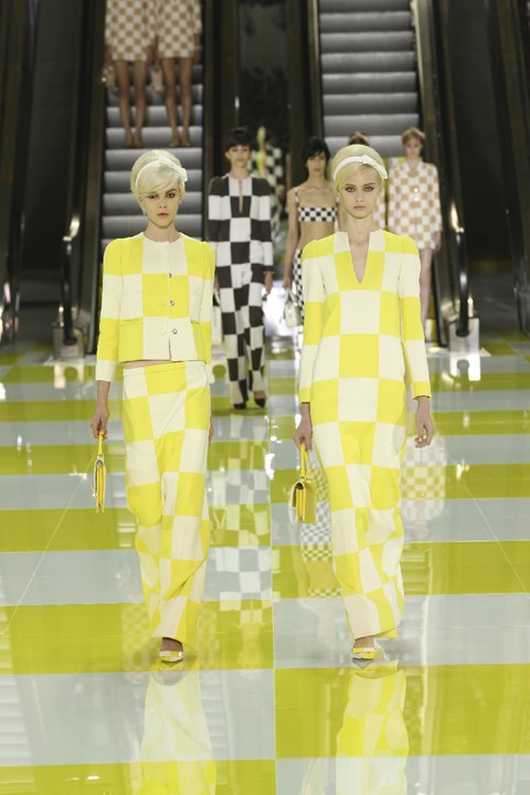 Watch Rosalía perform on a yellow lowrider for Louis Vuitton fashion show  in Paris