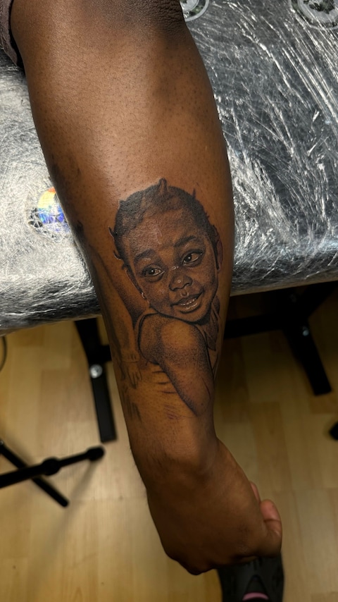 AFRODERM tattoo convention Black skin 43
