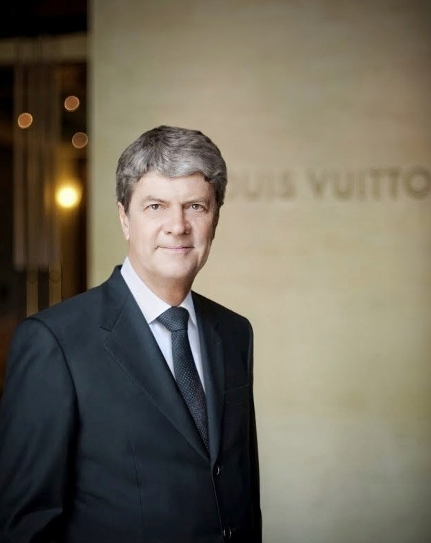 Yves Carcelle (L), Chairman and CEO of Louis Vuitton, Chinese