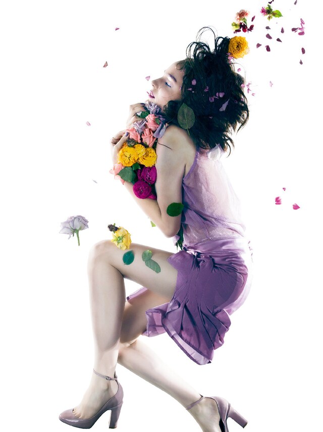 Dress by Nina Ricci; shoes by Valentino. 9