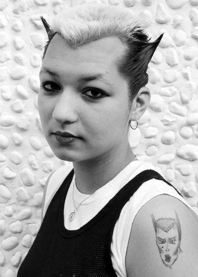 A punk with a Soo Catwoman tattoo on her shoulder, 4