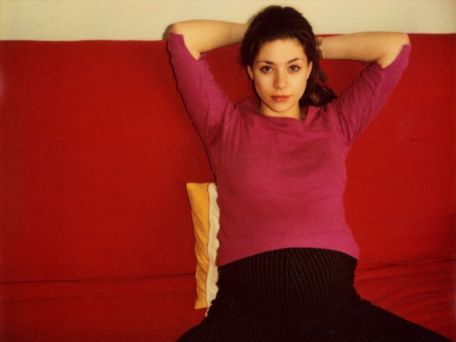 Siggie, with red sofa and red top (2002)