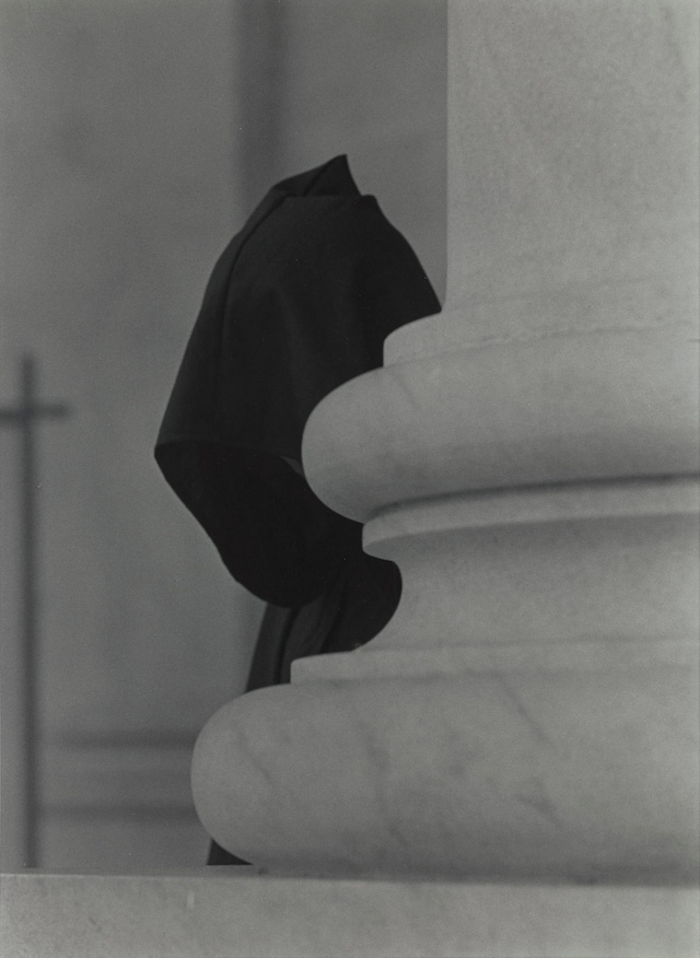 Roy DeCarava, “Protester behind pillar ” (1975) 6