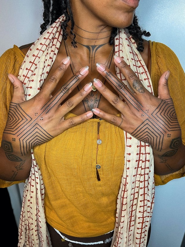 Emmanuel Uchenna Item tattoos
