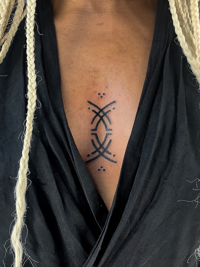 Emmanuel Uchenna Item tattoos 1