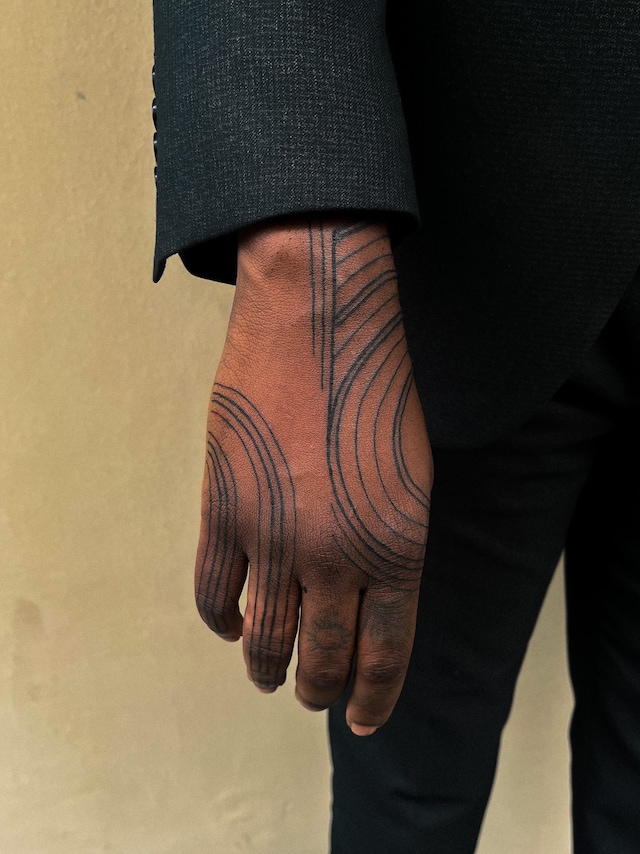 Emmanuel Uchenna Item tattoos 3