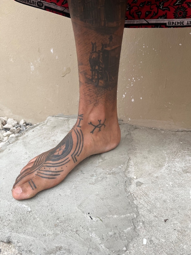 Emmanuel Uchenna Item tattoos 12