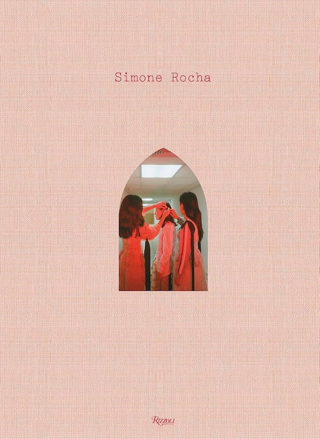 SIMONE GETS HER NOSE IN A BOOK