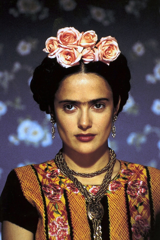 The Brief History of Wearing Flowers in your Hair 7