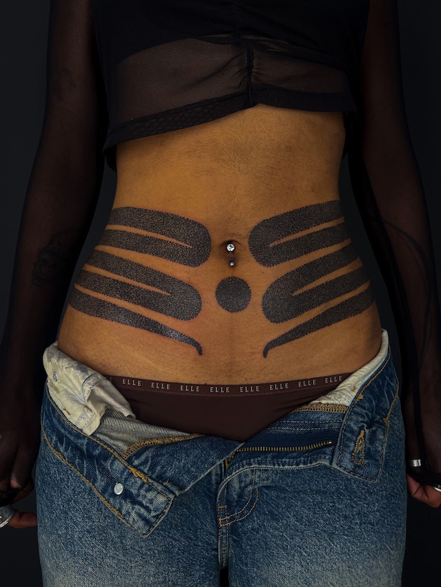 AFRODERM tattoo convention Black skin 1