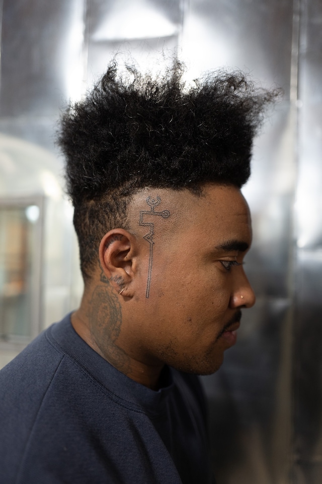AFRODERM tattoo convention Black skin 37