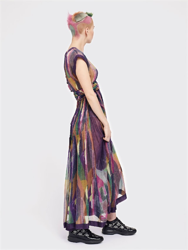 FLORENCE wears dress by CHANEL; shoes by KARL LAGE 0