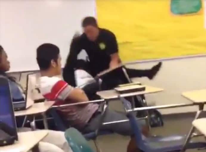 black teenager manhandle police