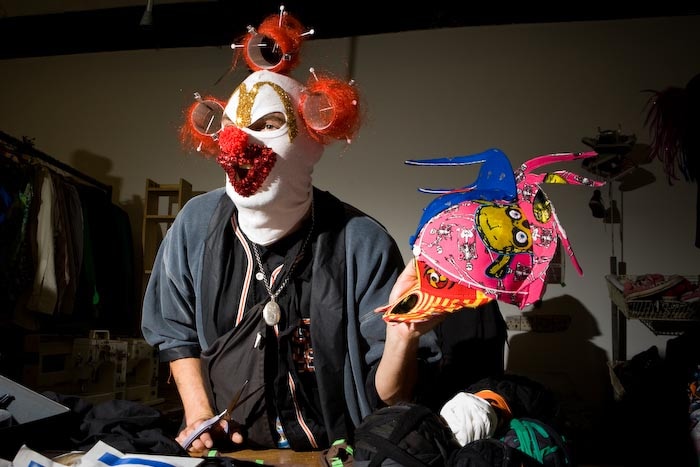JJ in his new studio on Brick Lane customising a h