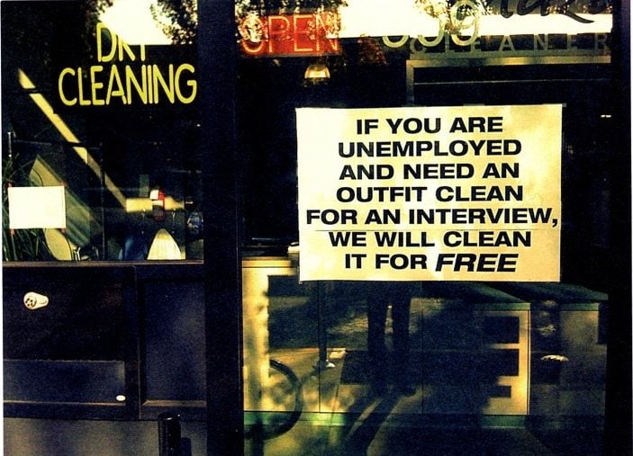 &quot;Sign in the dry cleaners window, 9th and Everett, 13