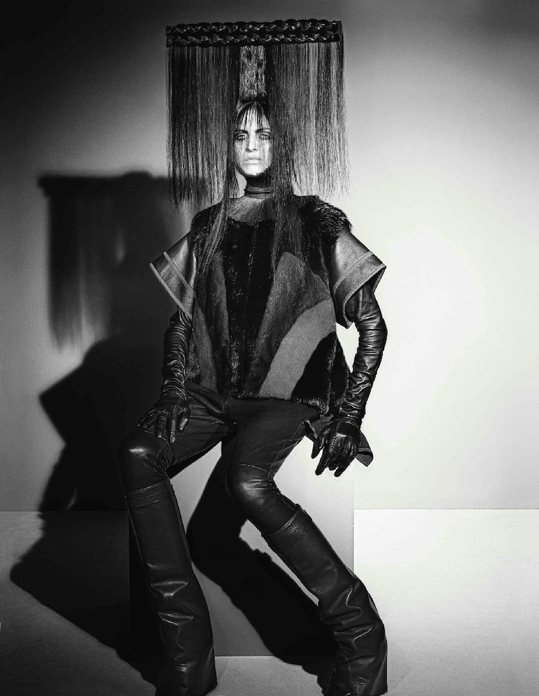Fur top, leather trousers, gloves and boots all by 7