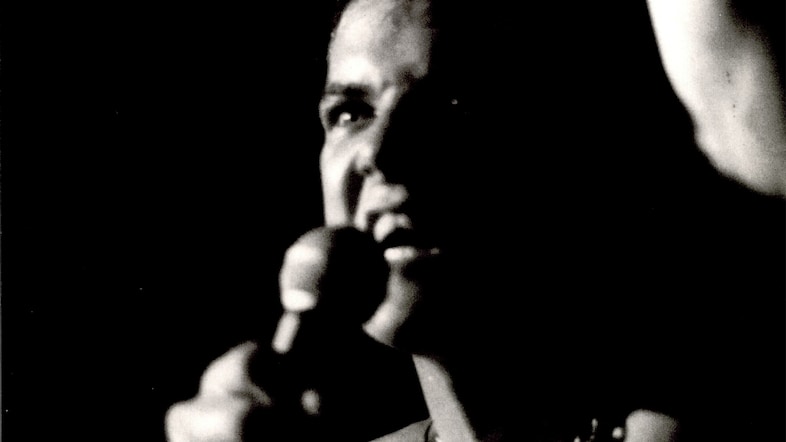 Darby Crash bellowing into the mic