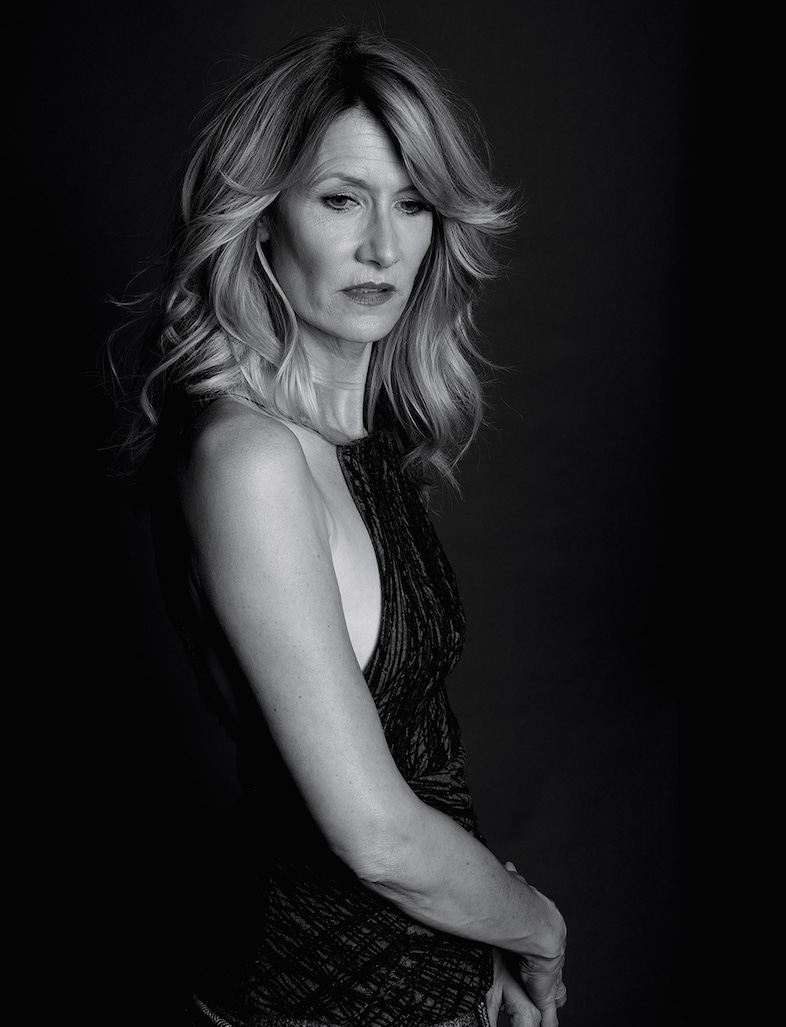Laura wears embroidered wool top by Hugo Boss 17