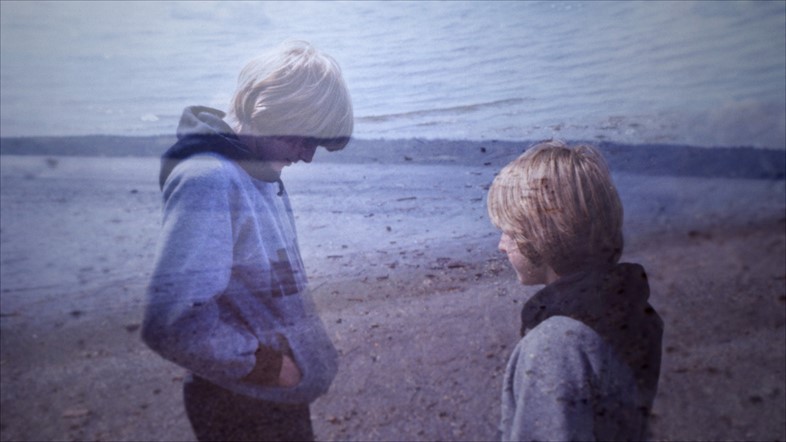 13-year-old Kurt Cobain walks along a beach in Washington