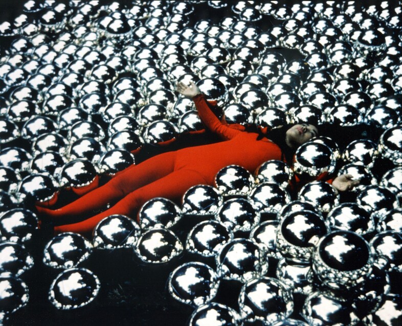 Kusama lying in Narcissus Garden Venice Biennial
