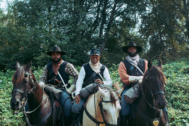 Black Cowboys Matter': Horseback protesters who grew up with George Floyd  lead the line in Houston