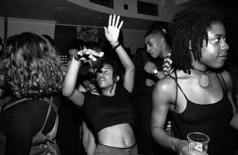 Girl lost in music clubbing Shoreditch London UK 2000s