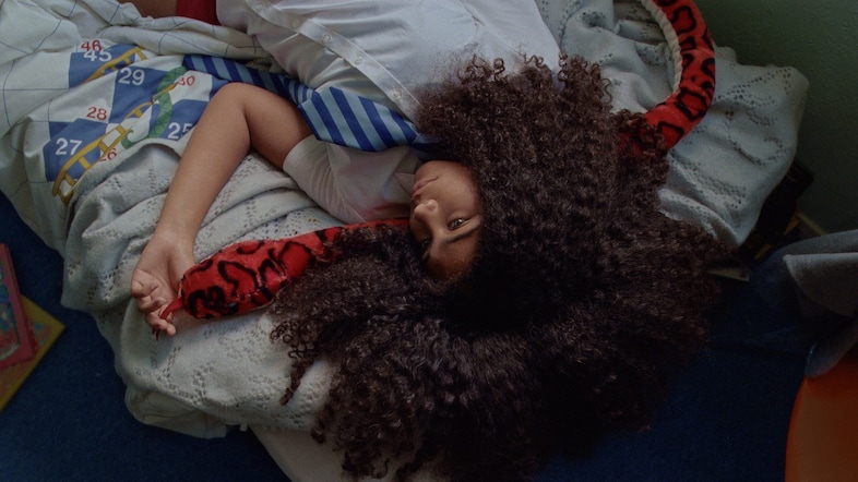 This film is an intimate portrait of Black hair and identity