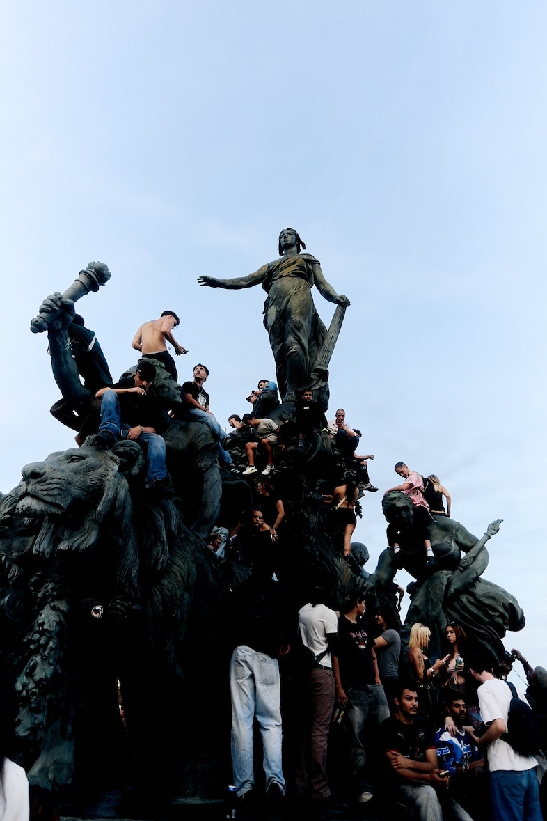 These photos capture techno ravers taking over the streets of Paris