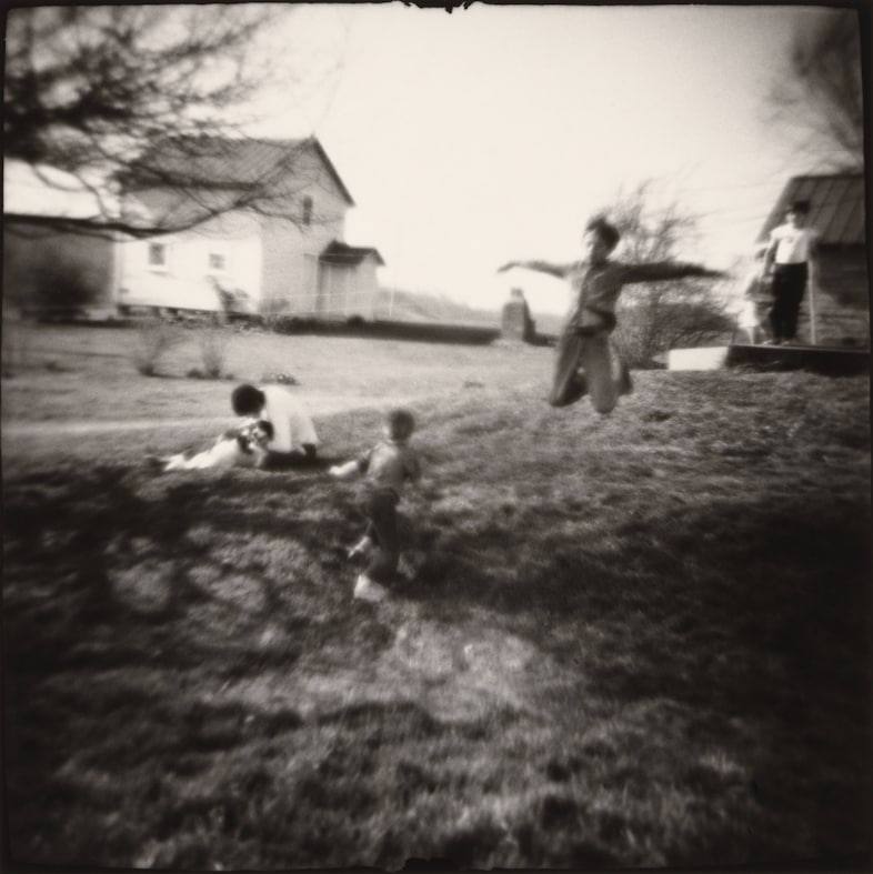 Nancy Rexroth, Boys Flying, Amesville, Ohio (1976)