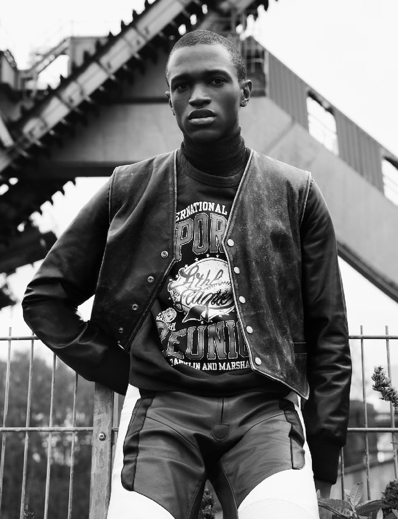 ALEJANDRO wears leather jumpsuit by MAISON MARTIN 10