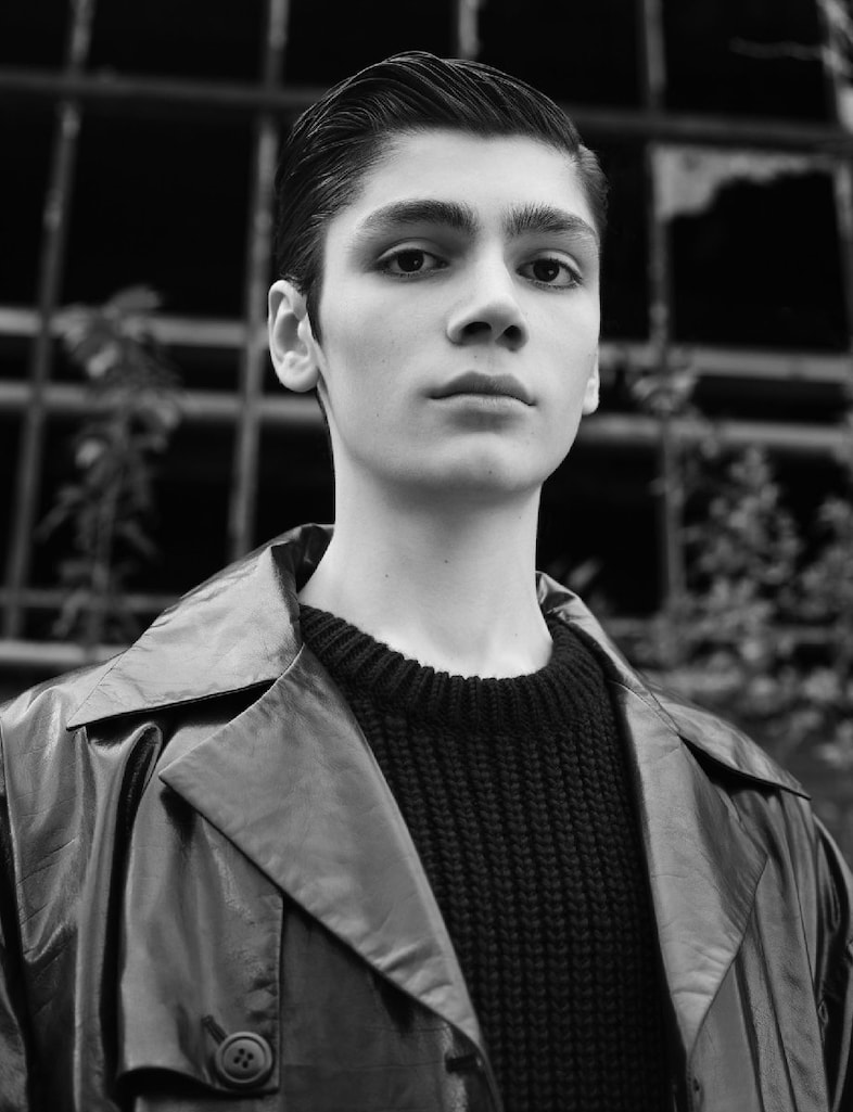  SULUMBEK wears trenchcoat by JIL SANDER; jumper b 8