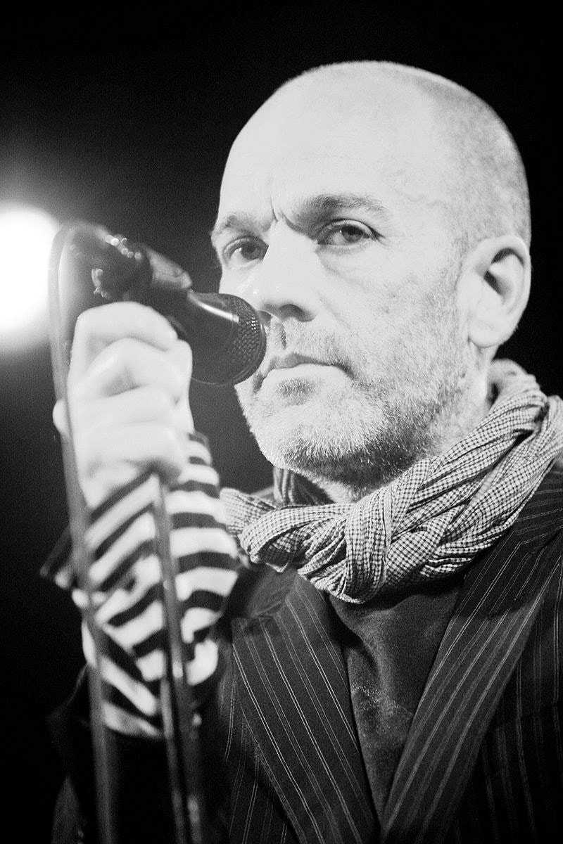 800px-Michael_Stipe_of_REM_photographed_by_Kris_Kr