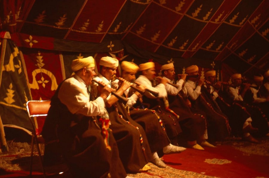 7 MASTER MUSICIAN PIPERS PERFORMING UNDER THE TENT 6