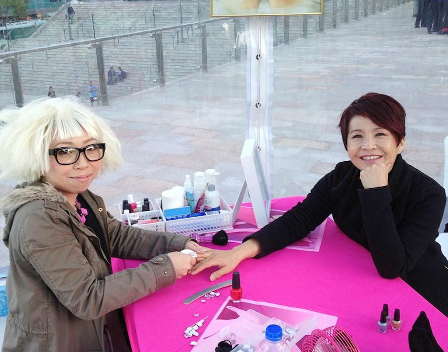 Getting nails done_photo by Riccardo Peach 0