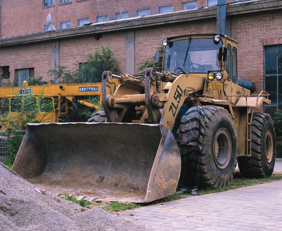 Liu Bolin - Hiding in the City No.71 - Bulldozer 13