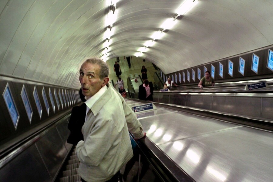 Startled man on escalator M8L1020077-1 17