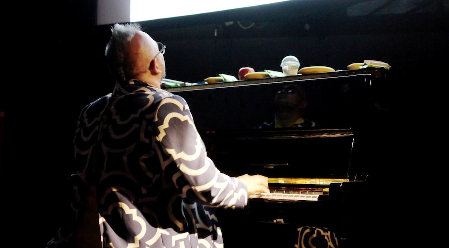 Khavn playing piano