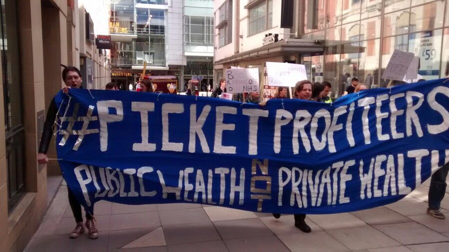 Marching through Manchester city centre 0