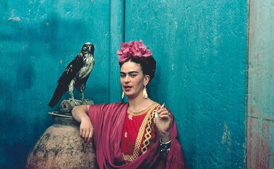 Frida Kahlo and her pet eagle