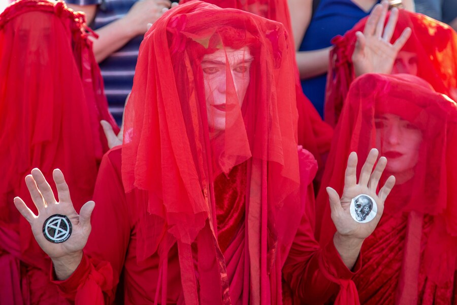 Extinction Rebellion&#39;s red-robed protesters 1