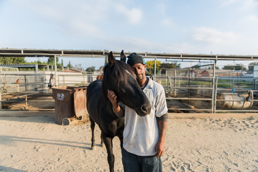 Anthony having a moment with his horse 19