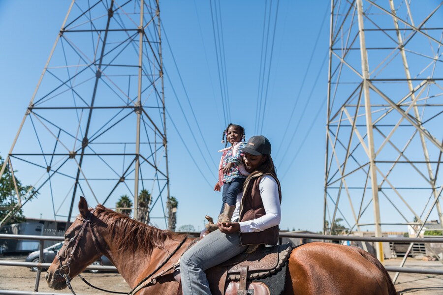Keiara and her daughter ride around 27