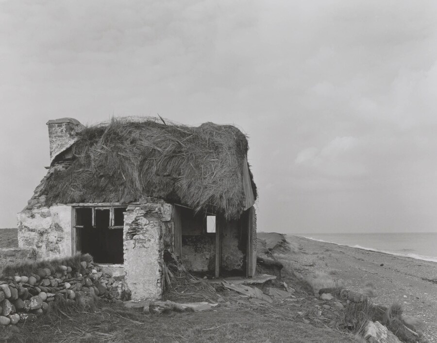 Chris Killip, “Cottage and coastal erosion, Cranstal, Bride” 6