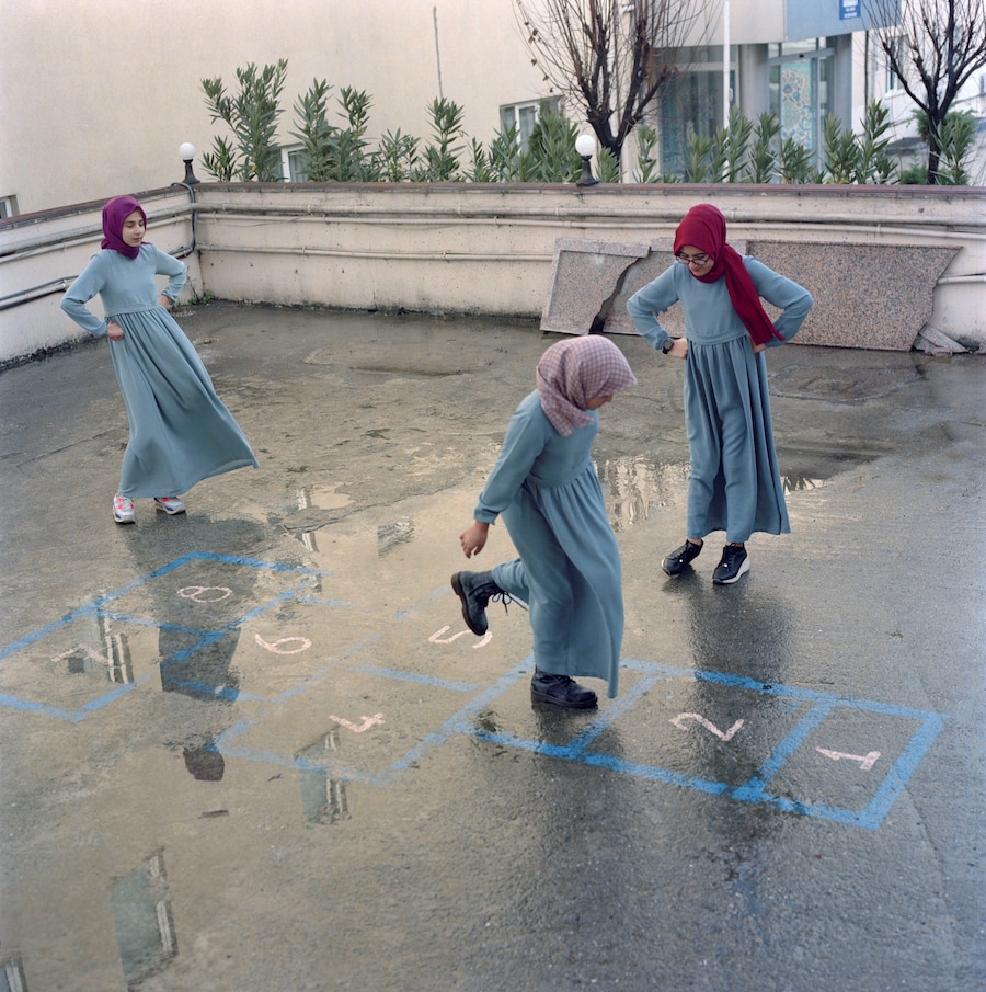 Sabiha &#199;imen, “Students play hopscotch...” 2