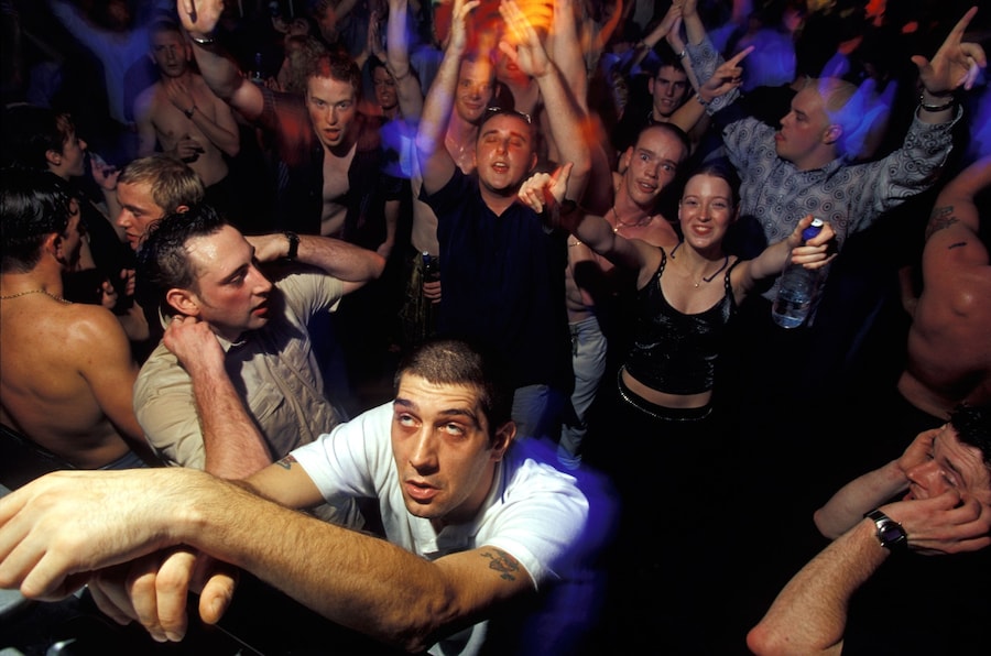 Crowd at Escape into them in Swansea with one man looking on 1