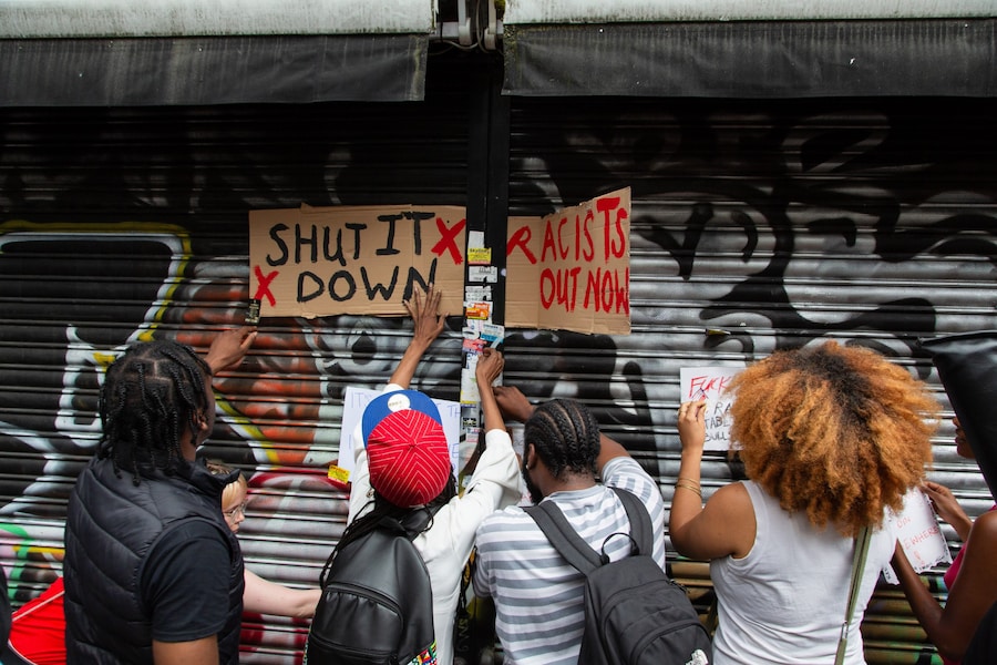 Protesters outside Peckham Hair and Cosmetics 9
